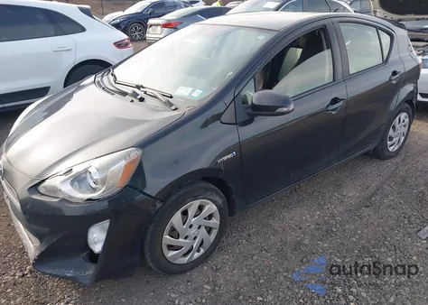 2015 Toyota Prius C One from USA, damaged, VIN JTDKDTB30F1100138